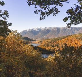 Autumn landscape view from Gartenhotel Moser showing mountains and river - 